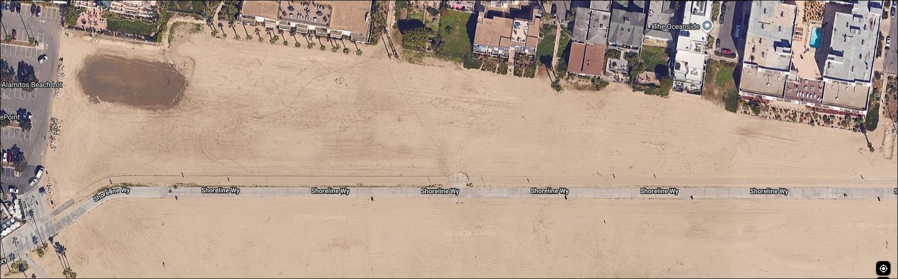 An aerial view of a beach venue with courts laid out